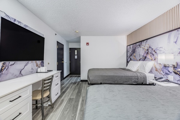 Two queen room and work desk