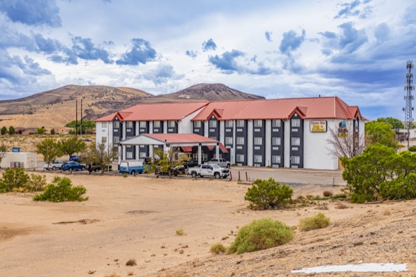 Western Skies Inn & Suites exterior with mountain view